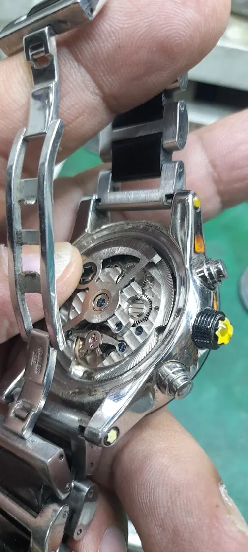 A watch opened up for repair at the shop